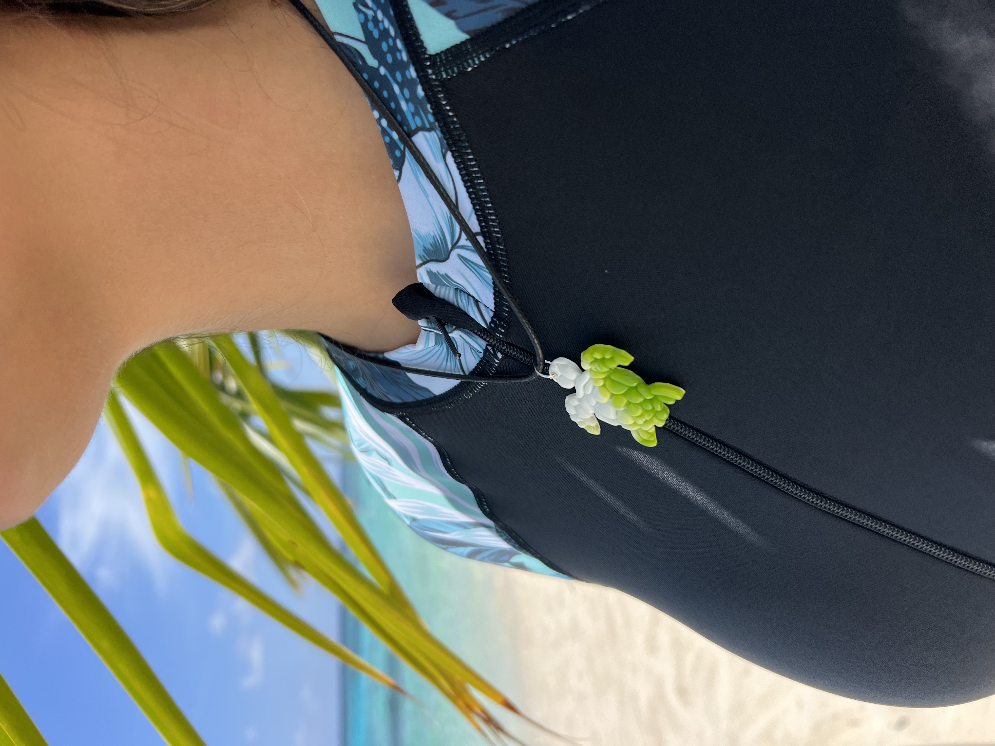 Turtle Necklace made from recycled plastic being worn