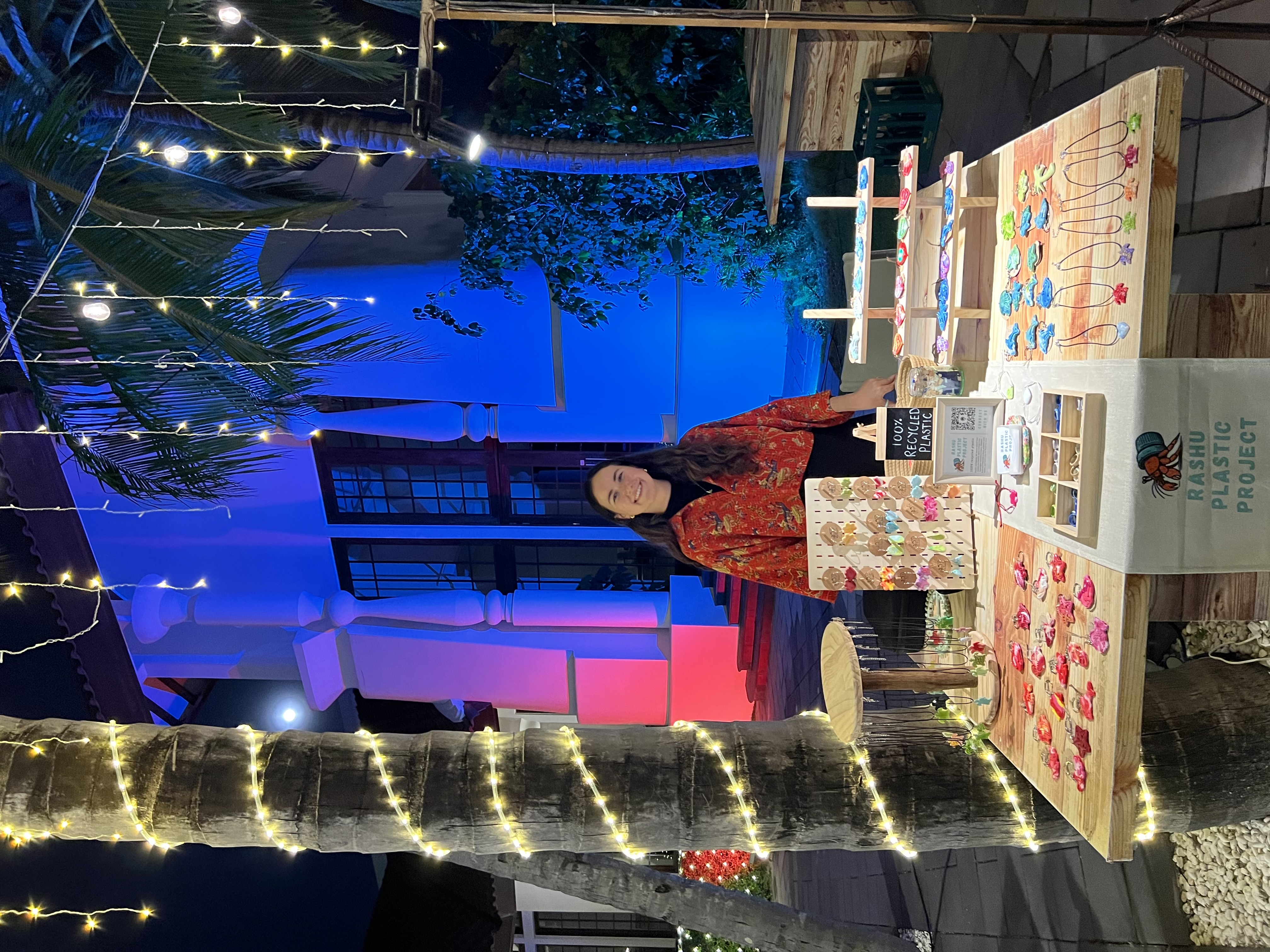Portrait of Bethany at a market stall with recycled products
